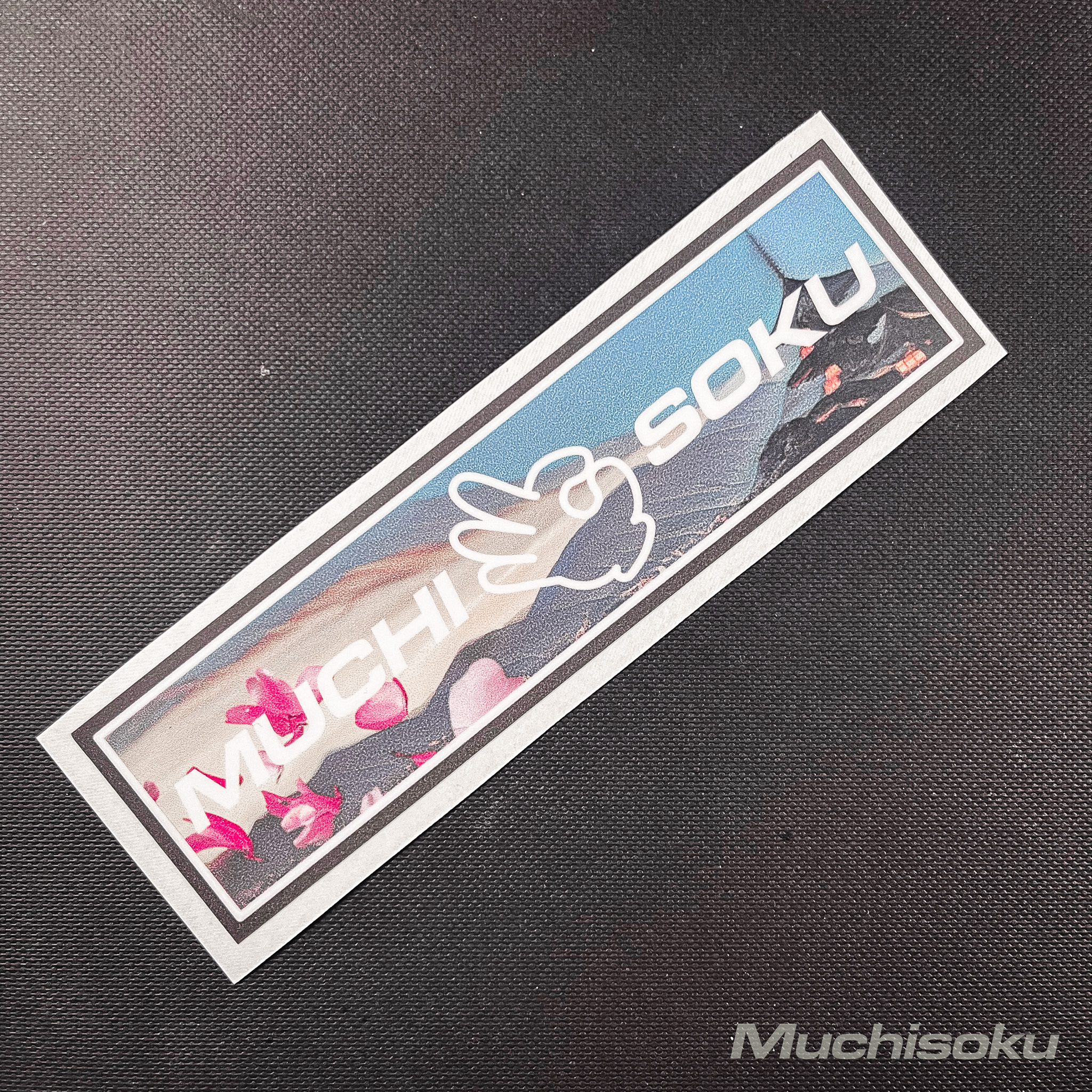 Fuji echo slap sticker with Mt. Fuji in the background. Features the Muchisoku typo and an OK hand signal in white.